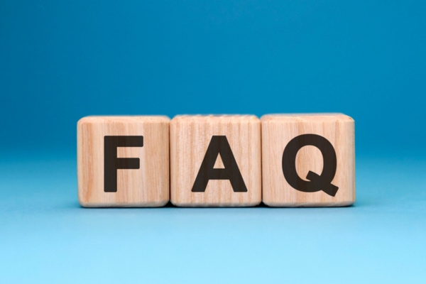 FAQ spelled using wooden letter cubes depicting Oil Heating System Maintenance questions