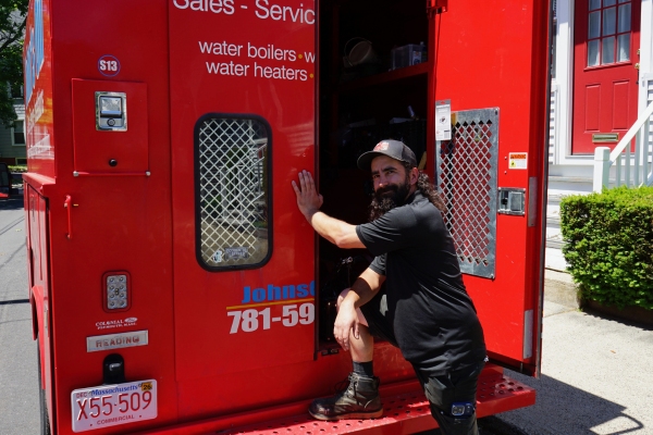 John's Oil & Propane HVAC technician and service van
