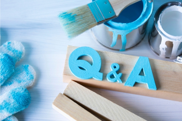 Word writing Q and A and painting tools depicting Propane Outdoor Kitchen FAQs
